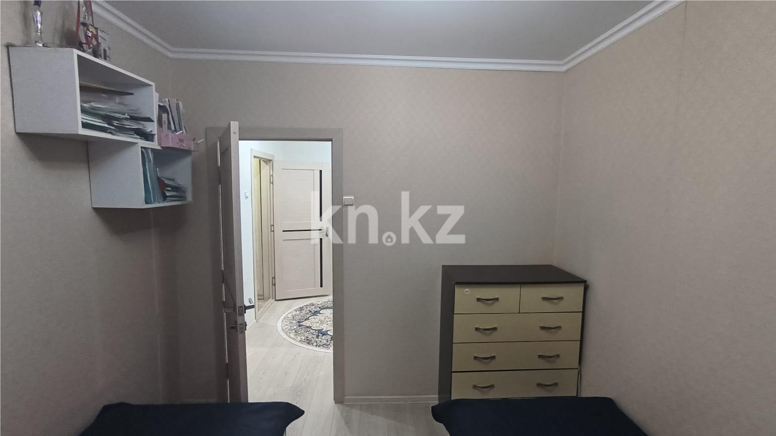 Продажа 3-комнатной квартиры, 64 м², мкр. Гульдер-1 в Караганде - фото 10