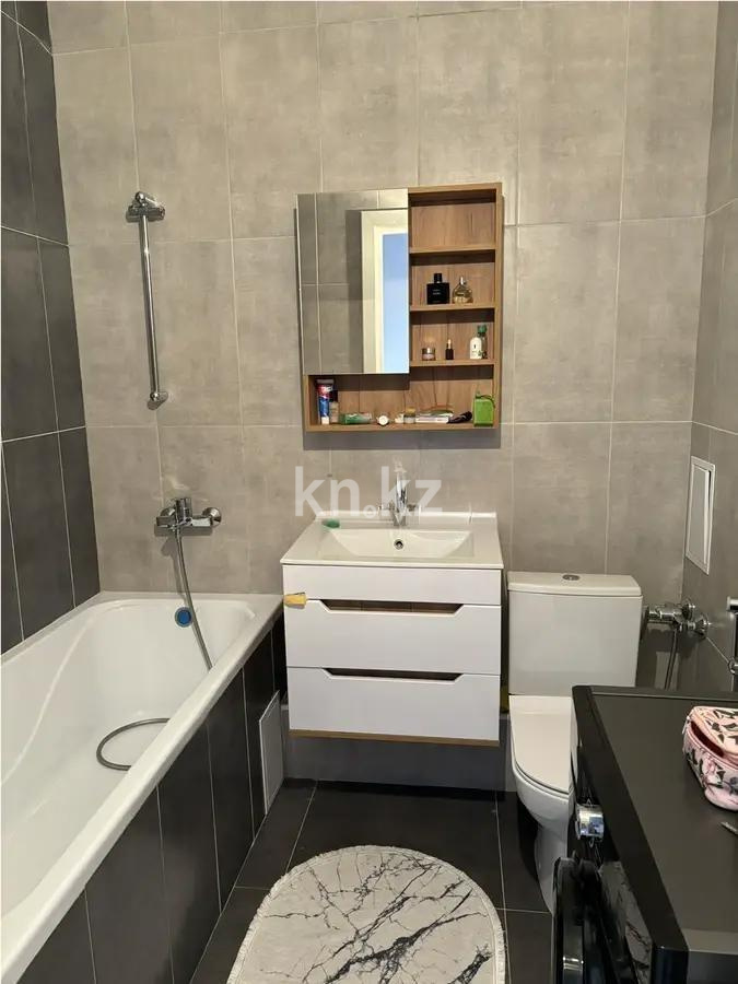 Продажа 1-комнатной квартиры, 40 м², ул. Толе би, дом  59 в Астане - фото 3
