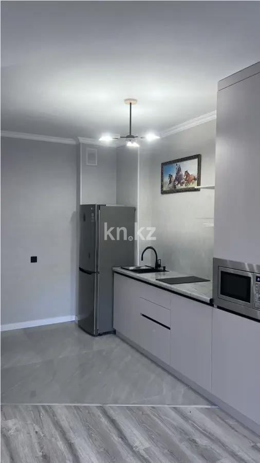 Продажа 1-комнатной квартиры, 43.9 м², мкр. Думан-2, дом  5 в Алматы - фото 2