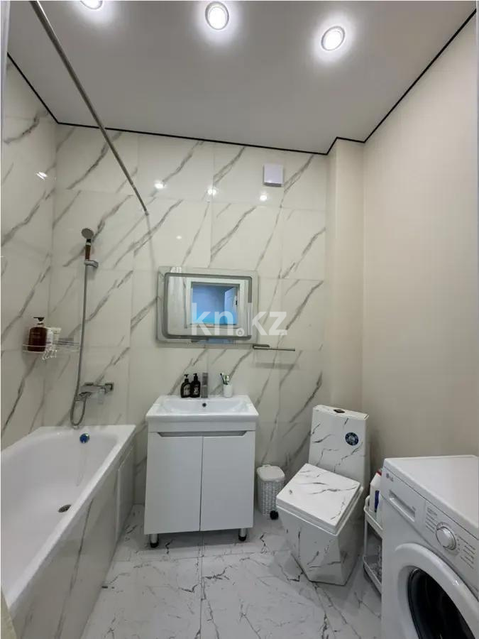 Продажа 1-комнатной квартиры, 45 м², ул. Толе би, дом  12/1 в Астане - фото 3