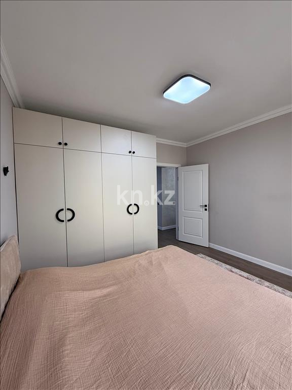 Продажа 2-комнатной квартиры, 52 м², ул. Толе би, дом  285/8 к13 - ул. Утеген батыра в Алматы - фото 10