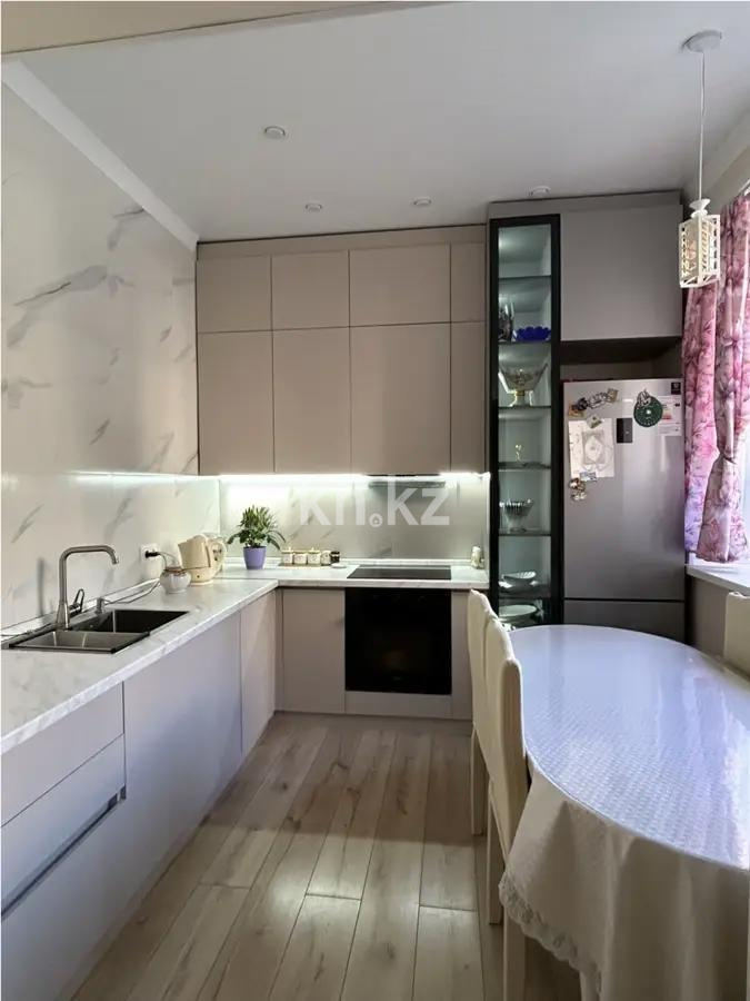 Продажа 2-комнатной квартиры, 52 м², ул. Толе би, дом  12/1 в Астане - фото 3