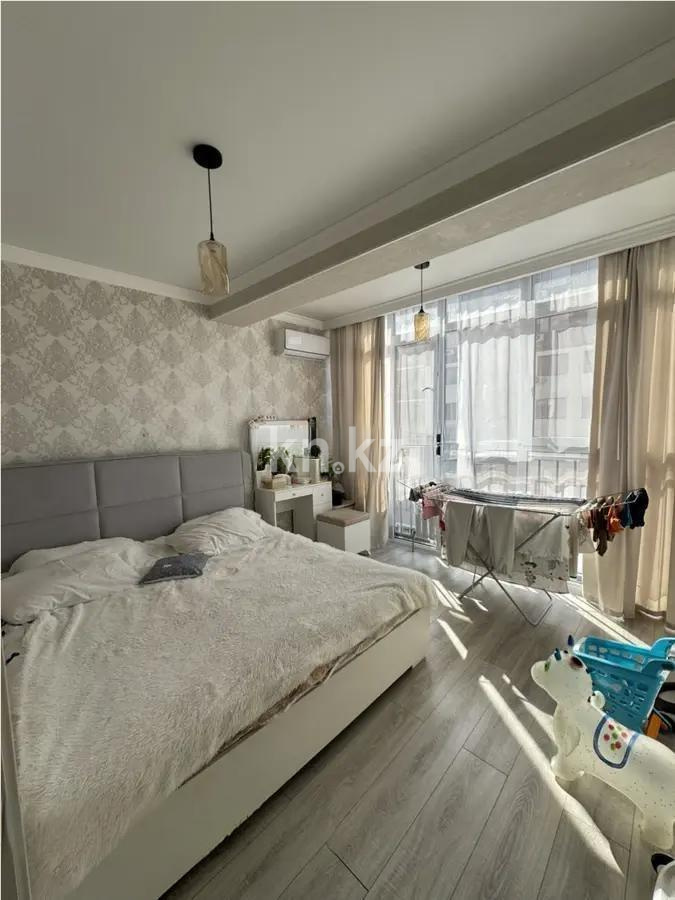Продажа 2-комнатной квартиры, 52 м², мкр. Сайран, дом  9 в Алматы - фото 2