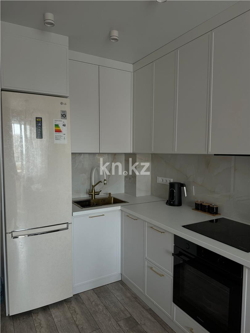 Продажа 1-комнатной квартиры, 47 м², ул. Момышулы в Караганде - фото 4