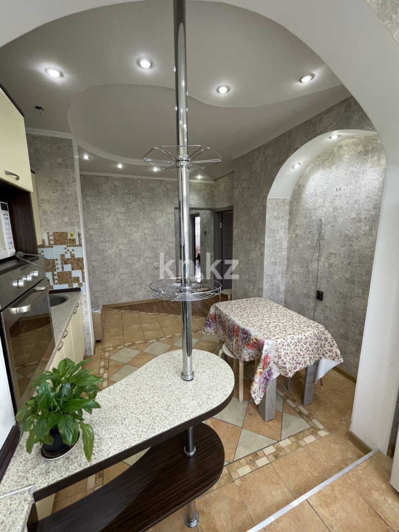 Аренда 2-комнатной квартиры, 66 м², Ислама Каримова, дом  52 - ул. Толе би в Алматы - фото 16