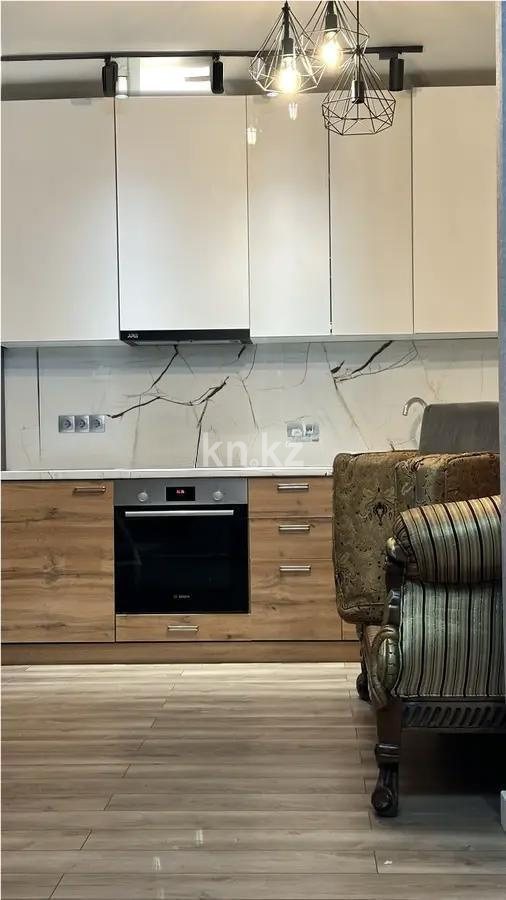 Продажа 3-комнатной квартиры, 100 м², ул. Толе би, дом  285/8 в Алматы - фото 2