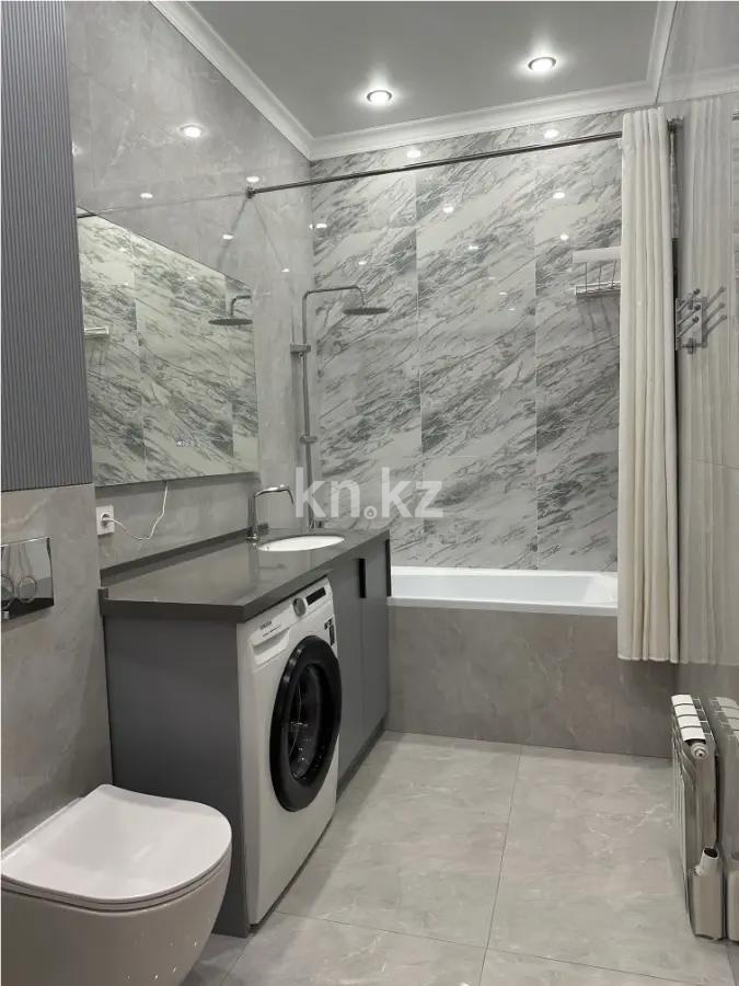 Продажа 2-комнатной квартиры, 63 м², ул. Омарова, дом  25 в Астане - фото 4