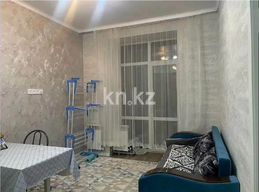 Продажа 1-комнатной квартиры, 40 м², ул. Момышулы, дом  15/2 в Караганде - фото 2