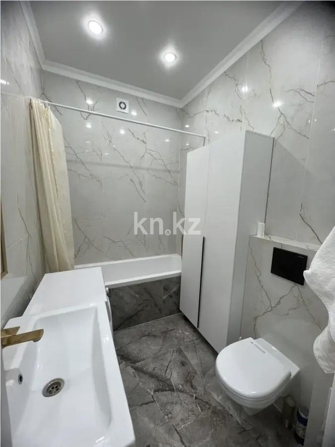 Продажа 2-комнатной квартиры, 51 м², ул. Толе би, дом  25а в Астане - фото 4