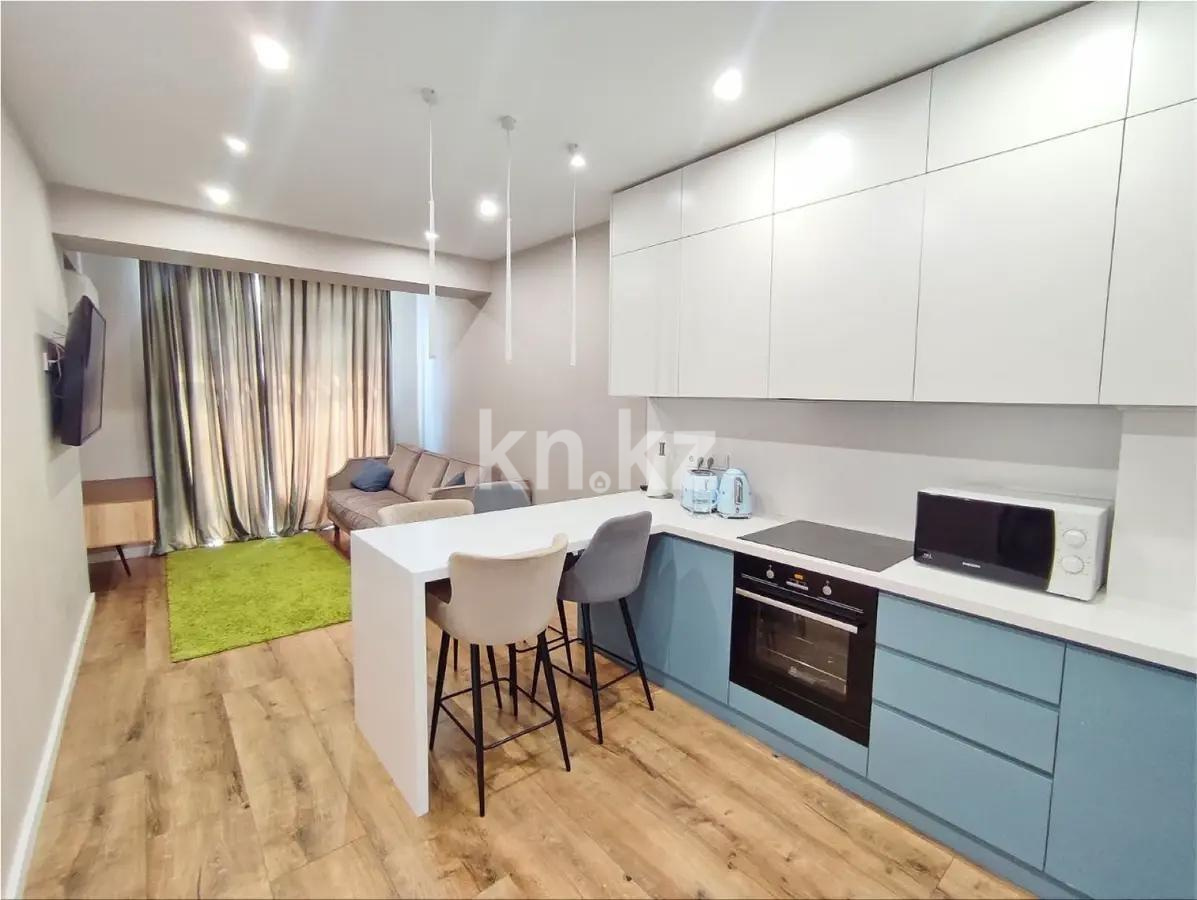 Продажа 2-комнатной квартиры, 49 м², ул. Толе би, дом  189/3 в Алматы - фото 2