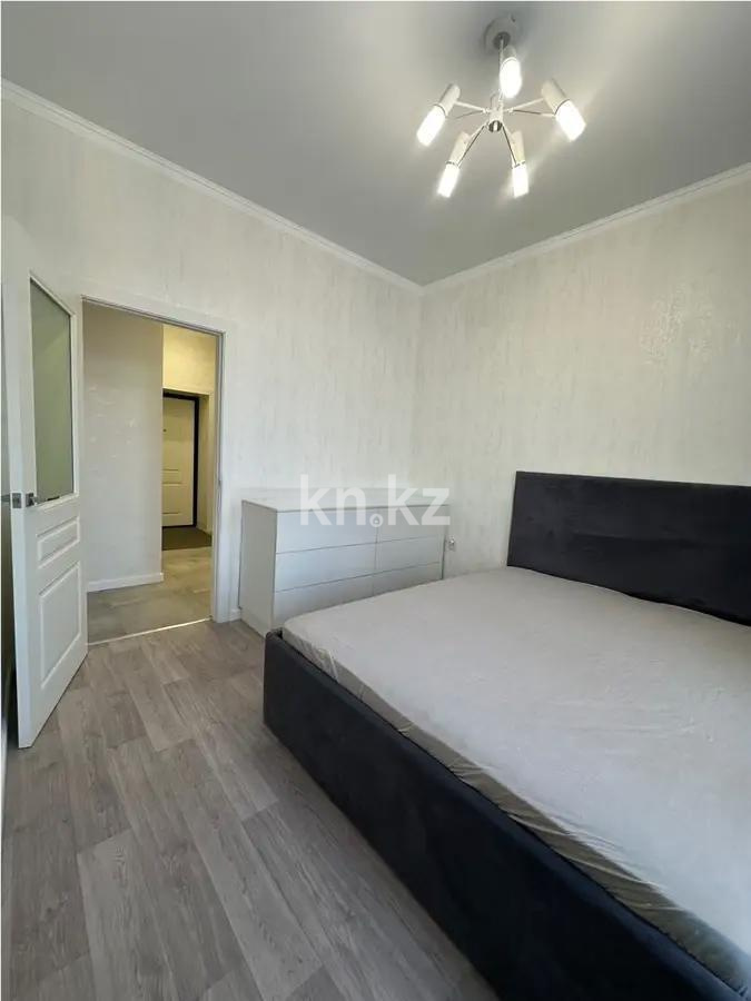 Продажа 2-комнатной квартиры, 50 м², пр. Строителей, дом  33/14 в Караганде - фото 2