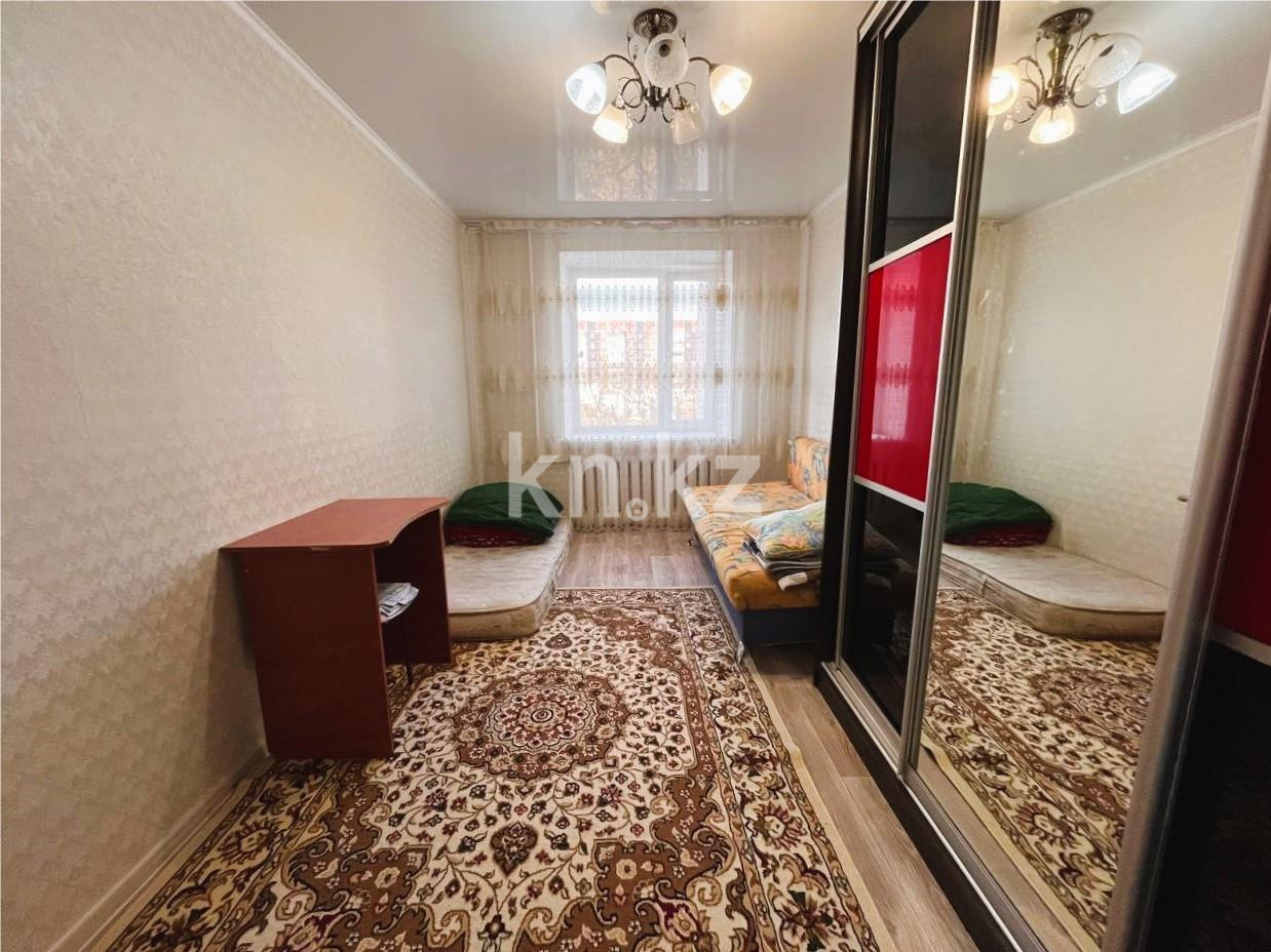 Продажа 4-комнатной квартиры, 75 м², пр. Республики, дом  18 в Караганде - фото 4