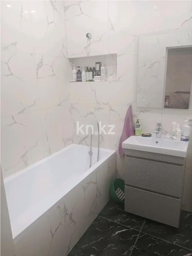 Продажа 2-комнатной квартиры, 65.3 м², ул. Толе би, дом  25а в Астане - фото 4