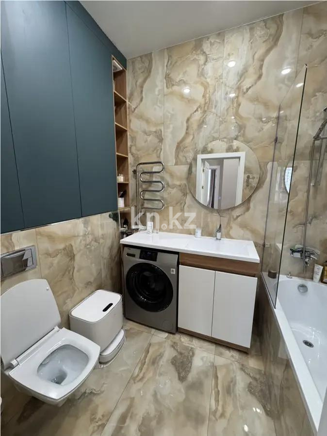 Продажа 2-комнатной квартиры, 59 м², ул. Казыбек би, дом  7 в Астане - фото 4