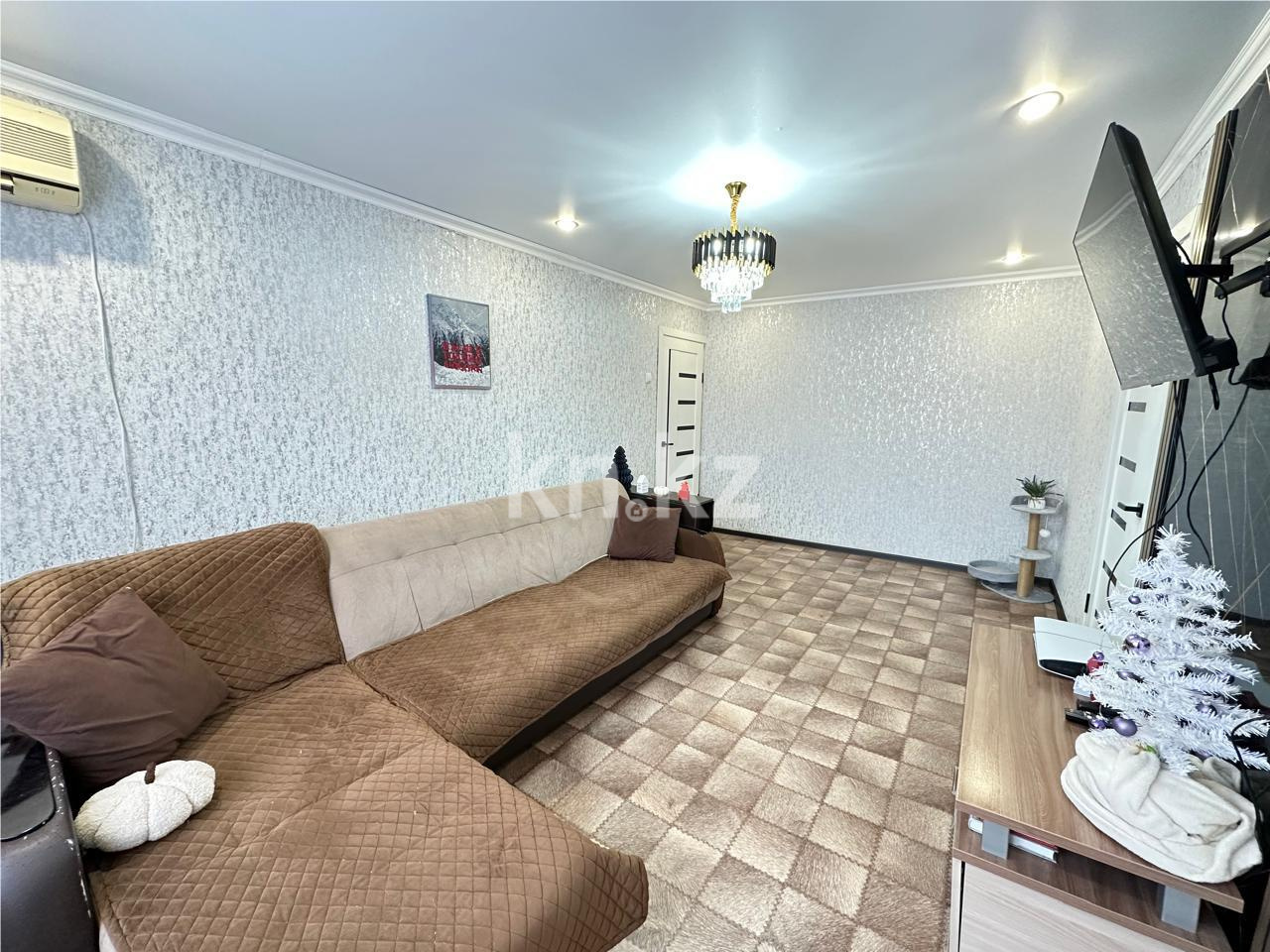 Продажа 4-комнатной квартиры, 61 м², 22 мкр. в Караганде - фото 3