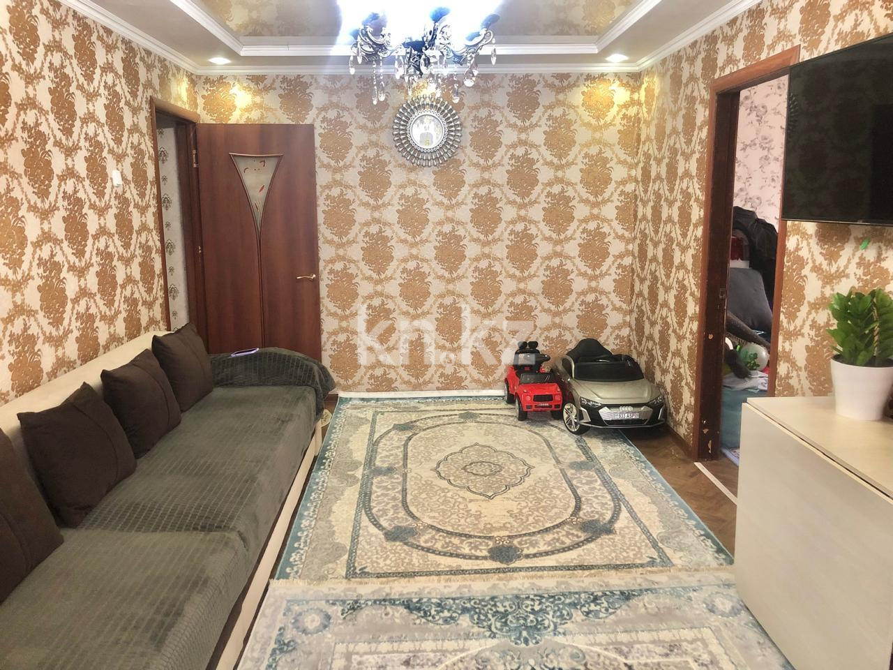 Продажа 4-комнатной квартиры, 61 м², мкр-н 15, дом  28 в Караганде - фото 2
