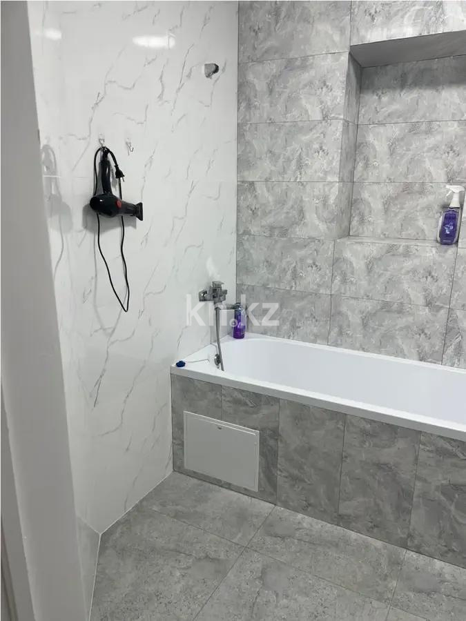 Продажа 3-комнатной квартиры, 105 м², ул. Омарова, дом  5/1 в Астане - фото 5
