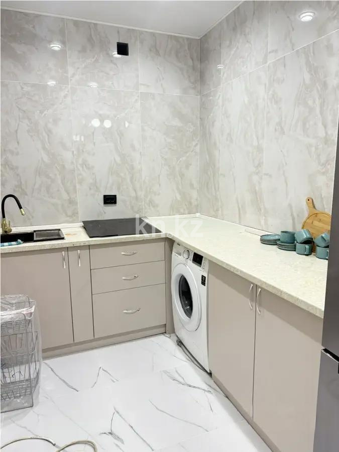 Продажа 2-комнатной квартиры, 51 м², мкр-н Кайрат, дом  303/4 в Алматы - фото 3