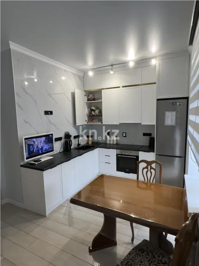 Продажа 2-комнатной квартиры, 51 м², ул. Толе би, дом  25а в Астане - фото 3