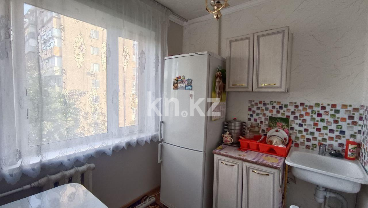 Продажа 1-комнатной квартиры, 33 м², 15 мкр., дом  30 в Караганде - фото 5