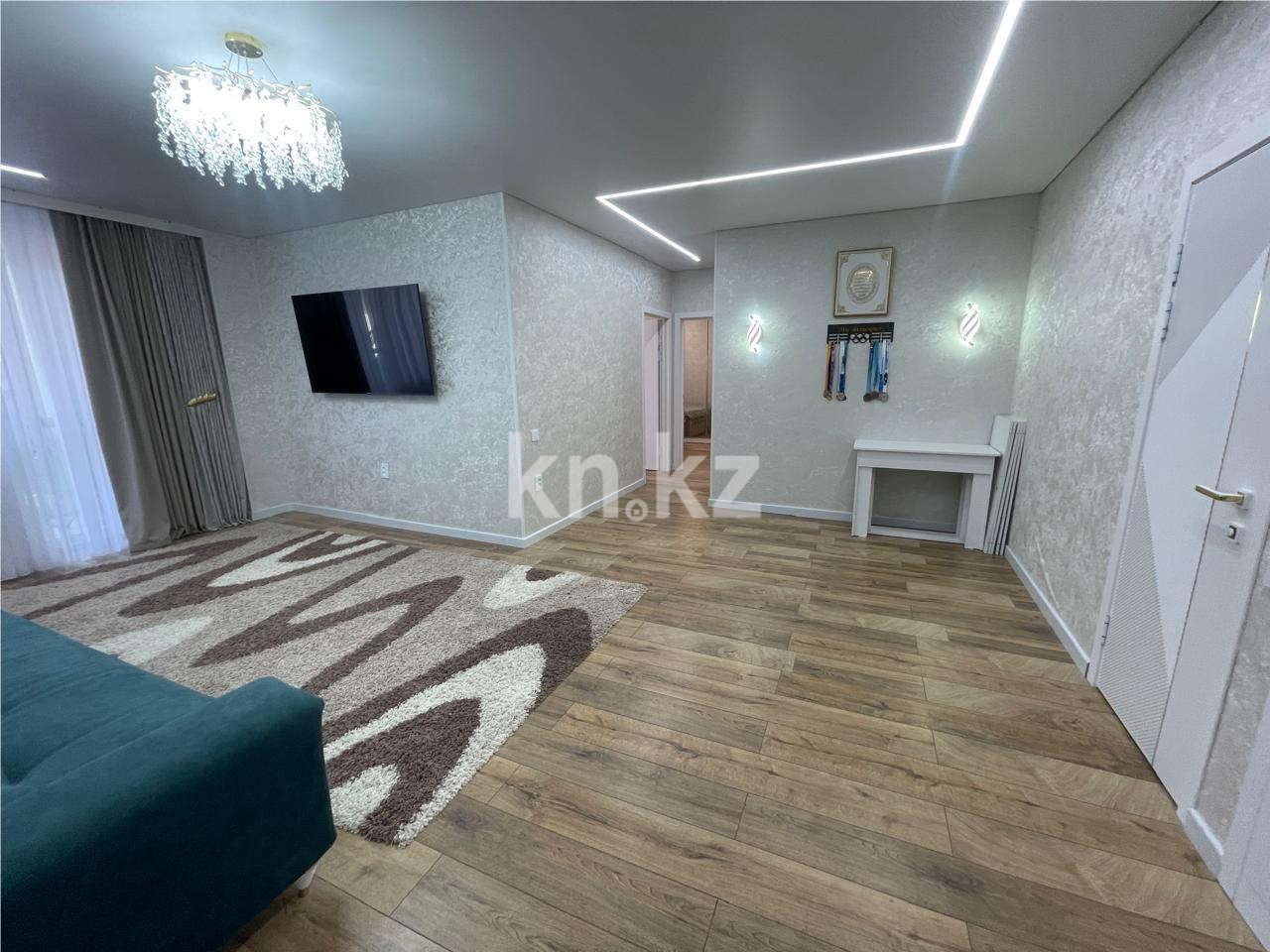 Продажа 2-комнатной квартиры, 63 м², ул. Муканова в Караганде - фото 2