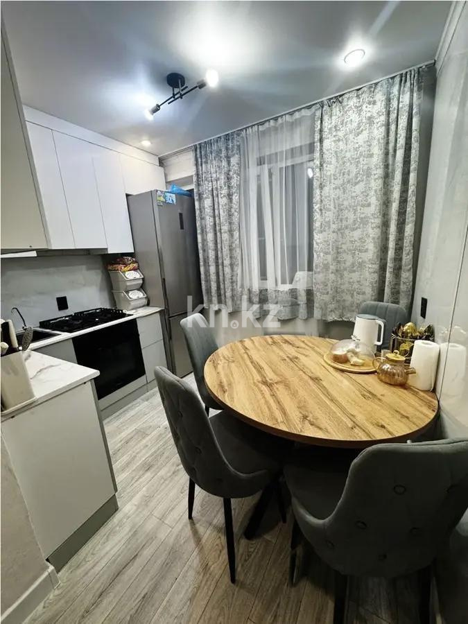 Продажа 2-комнатной квартиры, 52 м², пр. Строителей, дом  19 в Караганде - фото 3