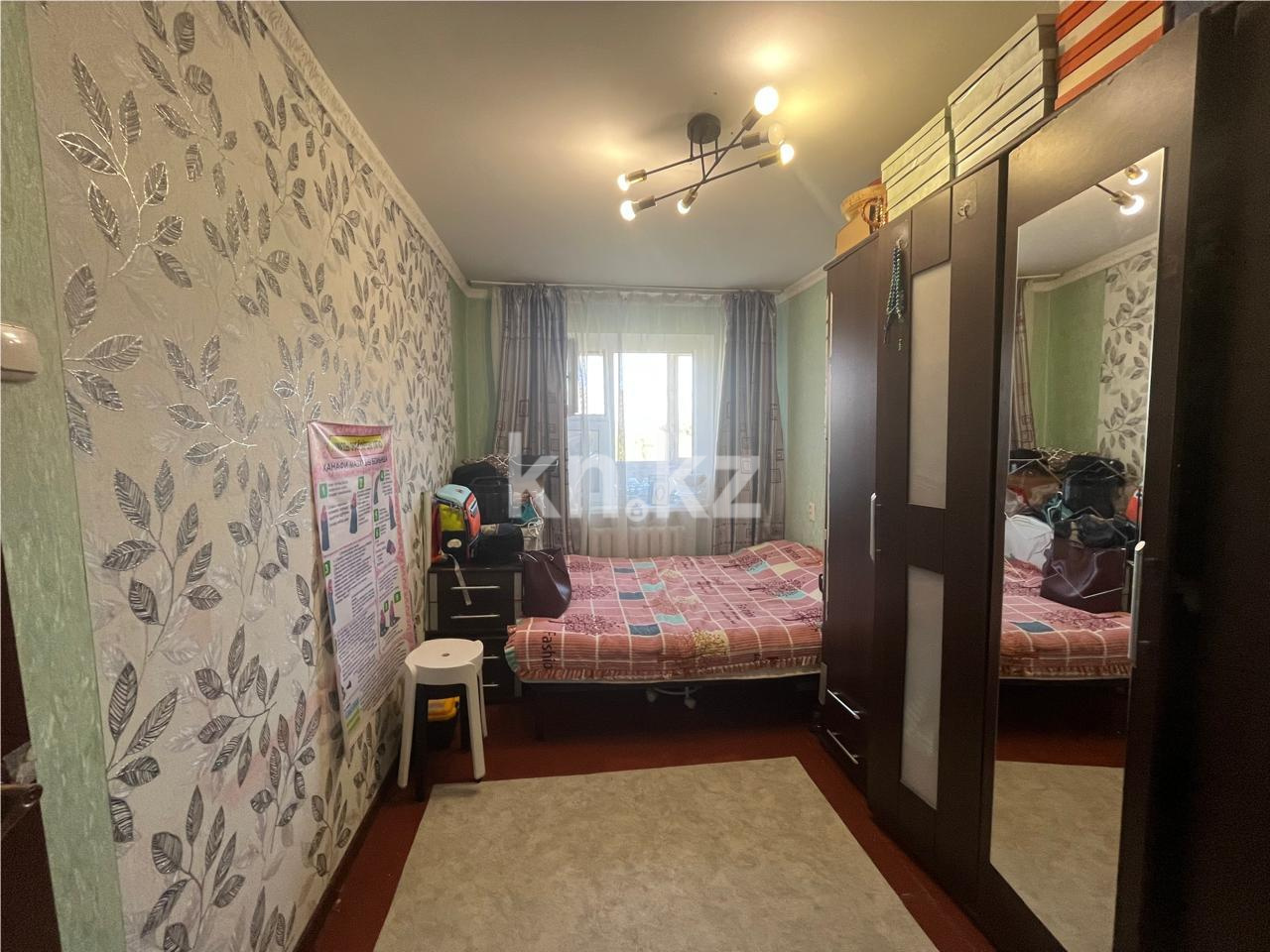 Продажа 4-комнатной квартиры, 63 м², пр. Строителей, дом  17 в Караганде - фото 4