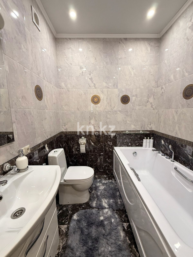 Продажа 4-комнатной квартиры, 106 м², ул. Куанышбаева, дом  9/2 в Астане - фото 25