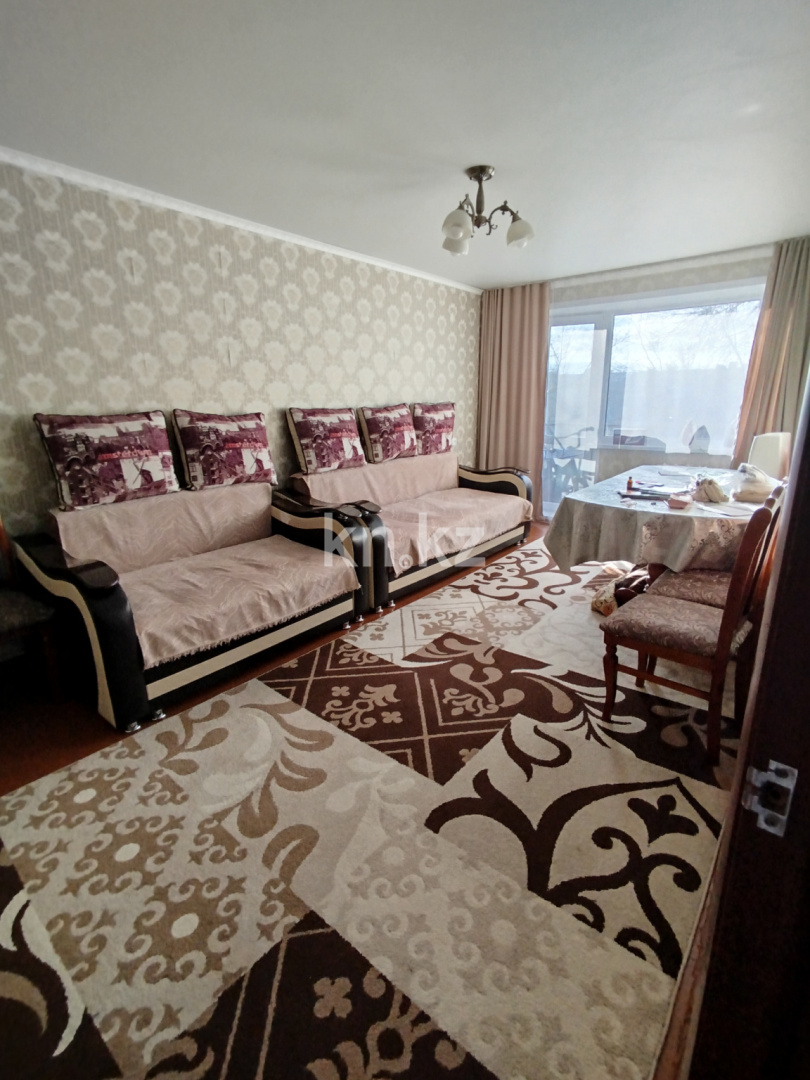 Продажа 3-комнатной квартиры, 62 м², 15 мкр., дом  18 в Караганде - фото 2