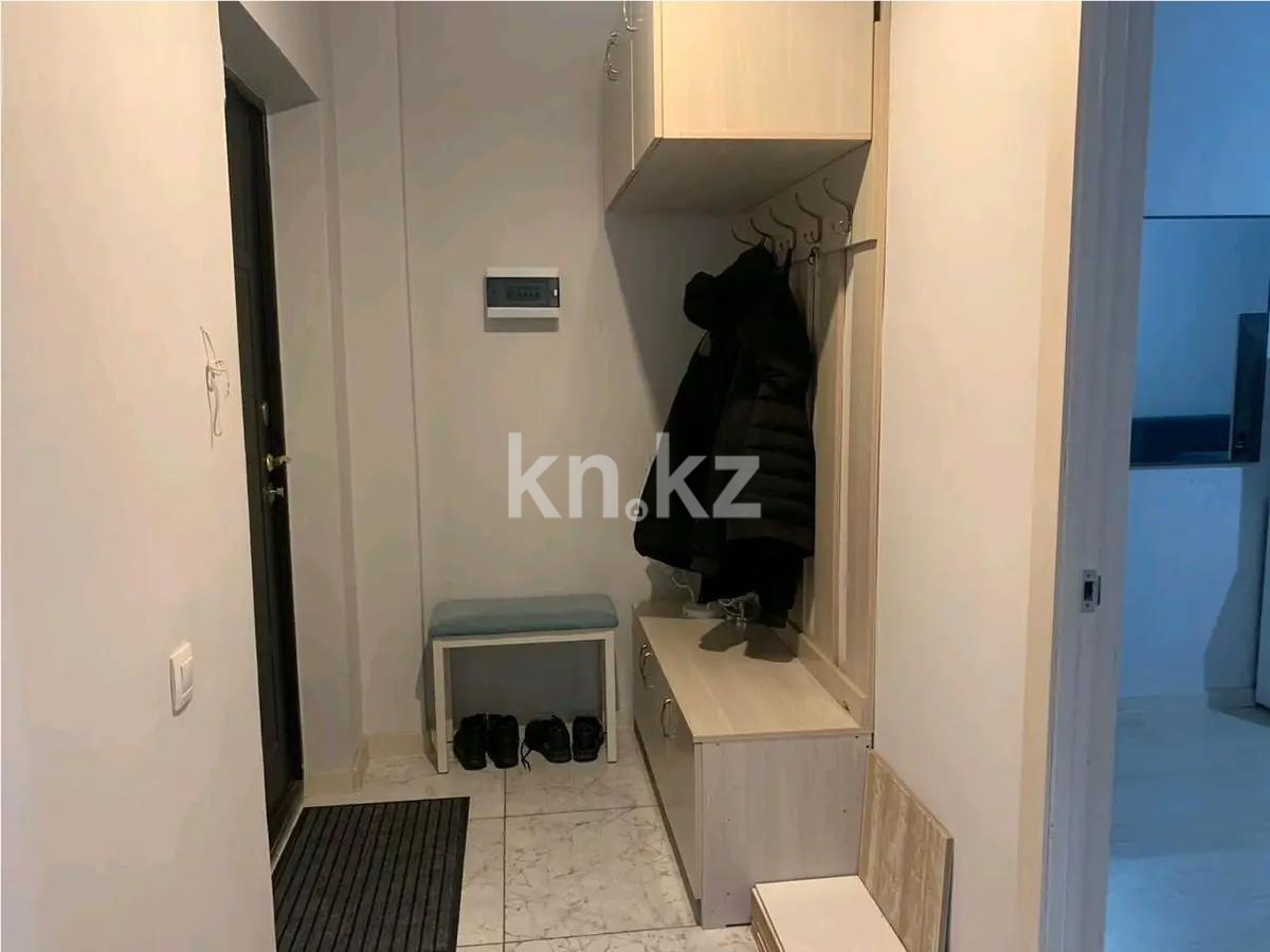 Продажа 1-комнатной квартиры, 37 м², ул. Омарова, дом  27 в Астане - фото 4