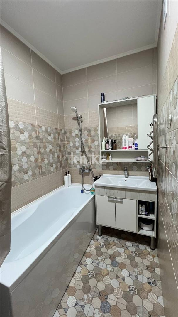 Продажа 2-комнатной квартиры, 64.2 м², ул. Сыганак в Астане - фото 9