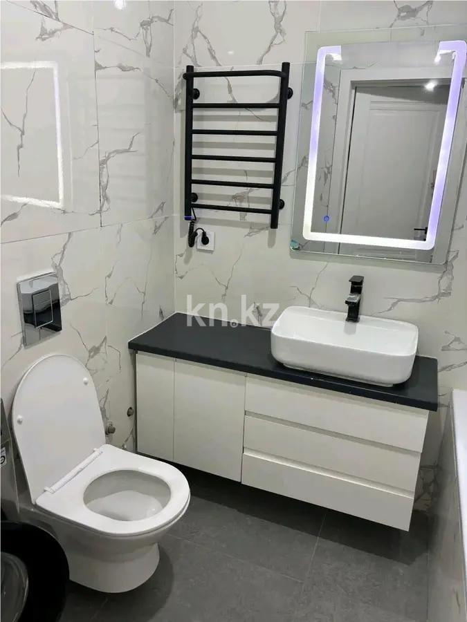 Продажа 2-комнатной квартиры, 58.2 м², пр. Кабанбай батыра, дом  59б в Астане - фото 4