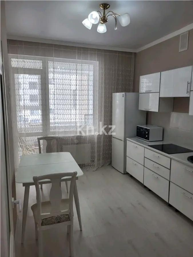 Продажа 1-комнатной квартиры, 37.7 м², ул. Толе би, дом  63 в Астане - фото 2