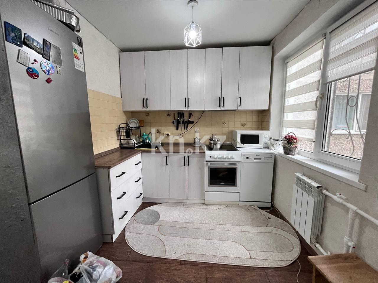 Продажа 4-комнатной квартиры, 76 м², ул. Дюсембекова в Караганде - фото 5