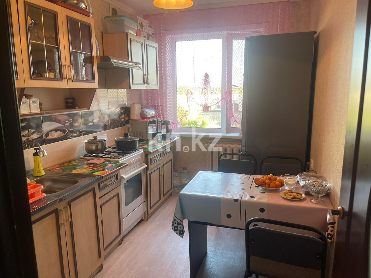 Продажа 4-комнатной квартиры, 61 м², ул. Муканова в Караганде - фото 11