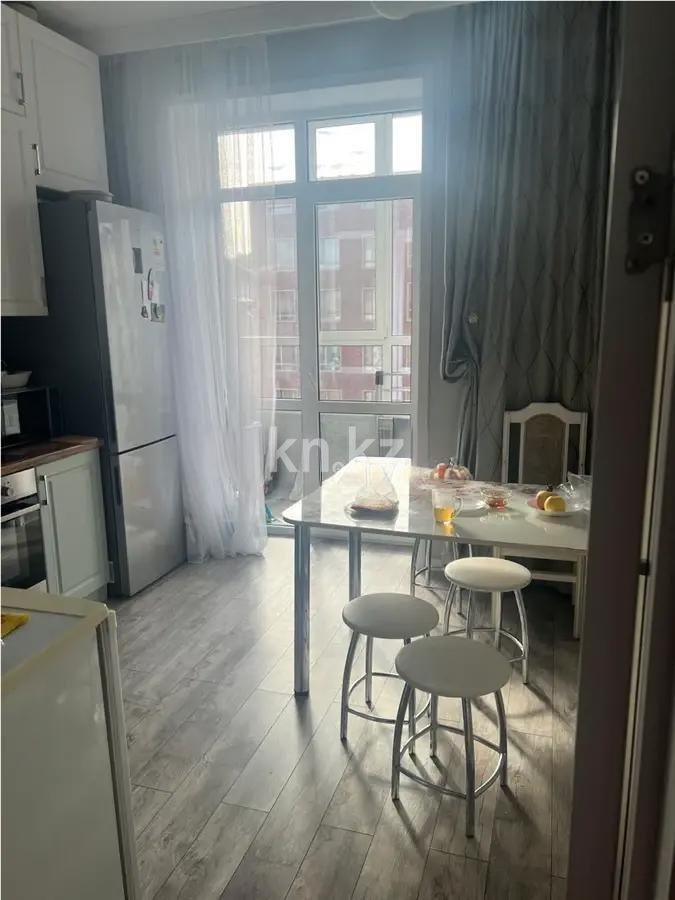 Продажа 2-комнатной квартиры, 59 м², ул. Омарова, дом  21/1 в Астане - фото 4
