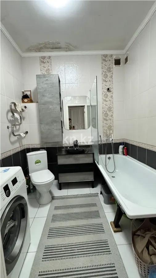 Продажа 1-комнатной квартиры, 56 м², ул. Куйши Дина, дом  30 в Астане - фото 3