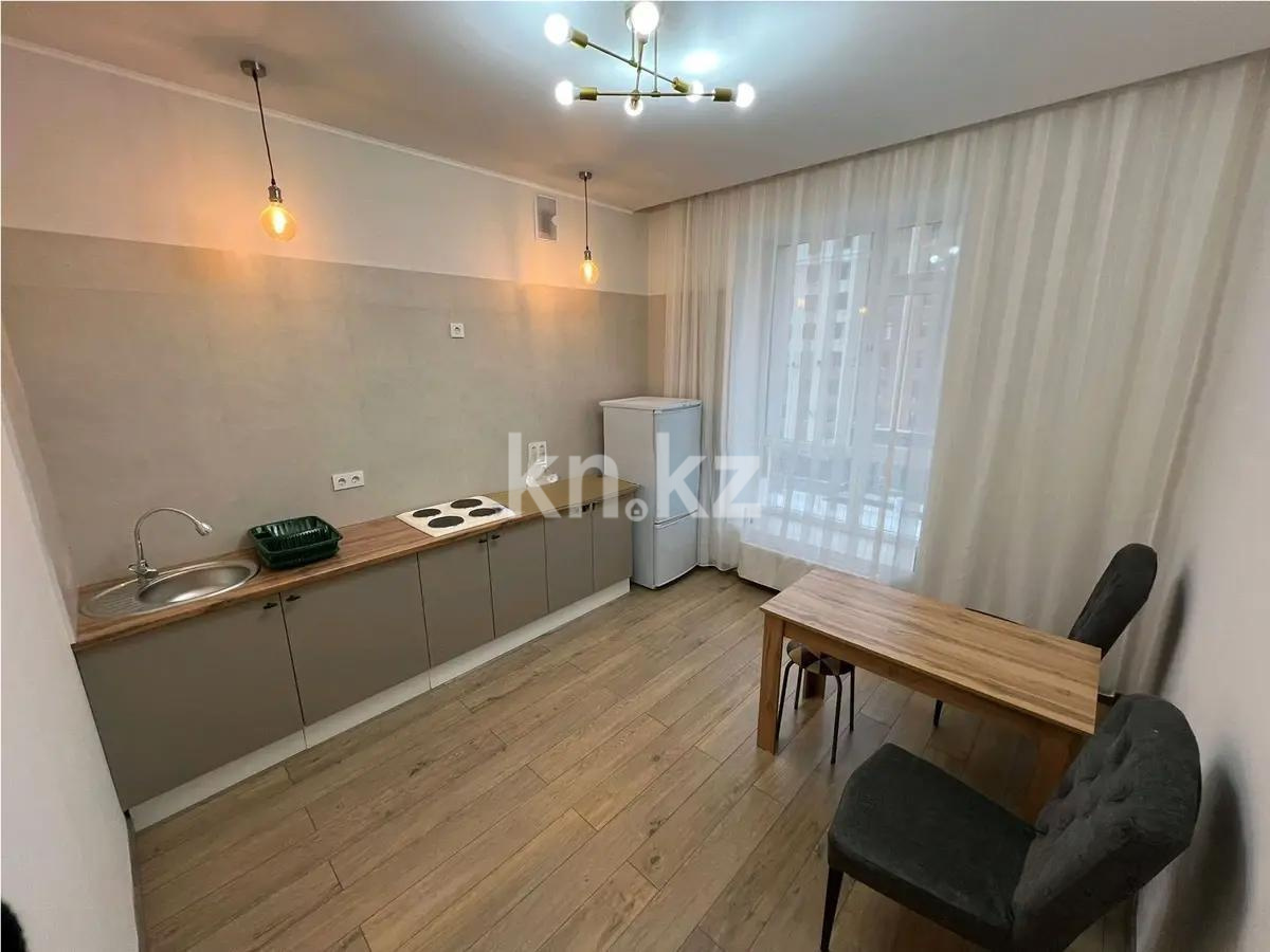 Продажа 1-комнатной квартиры, 40 м², ул. Омарова, дом  12в в Астане - фото 2