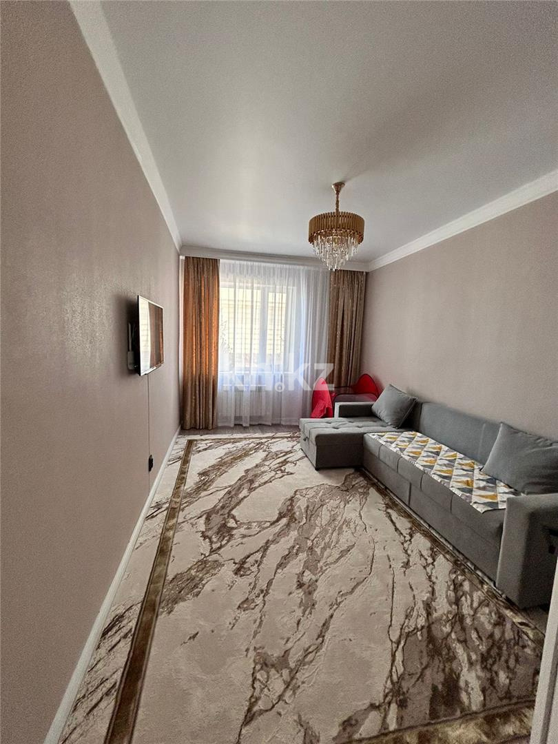 Продажа 2-комнатной квартиры, 65 м², ул. Муканова в Караганде - фото 2