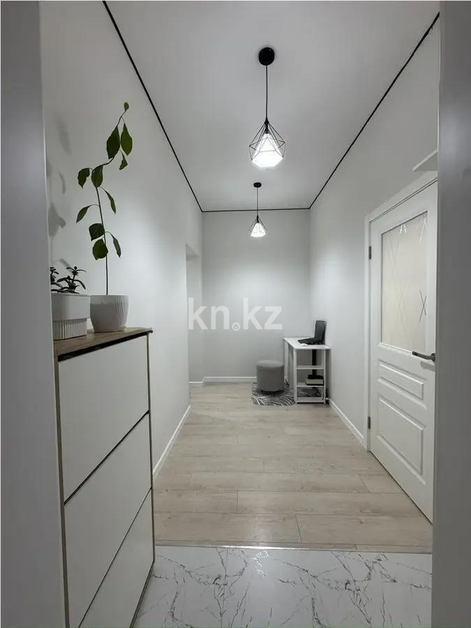 Продажа 1-комнатной квартиры, 45 м², ул. Толе би, дом  12/1 в Астане - фото 4