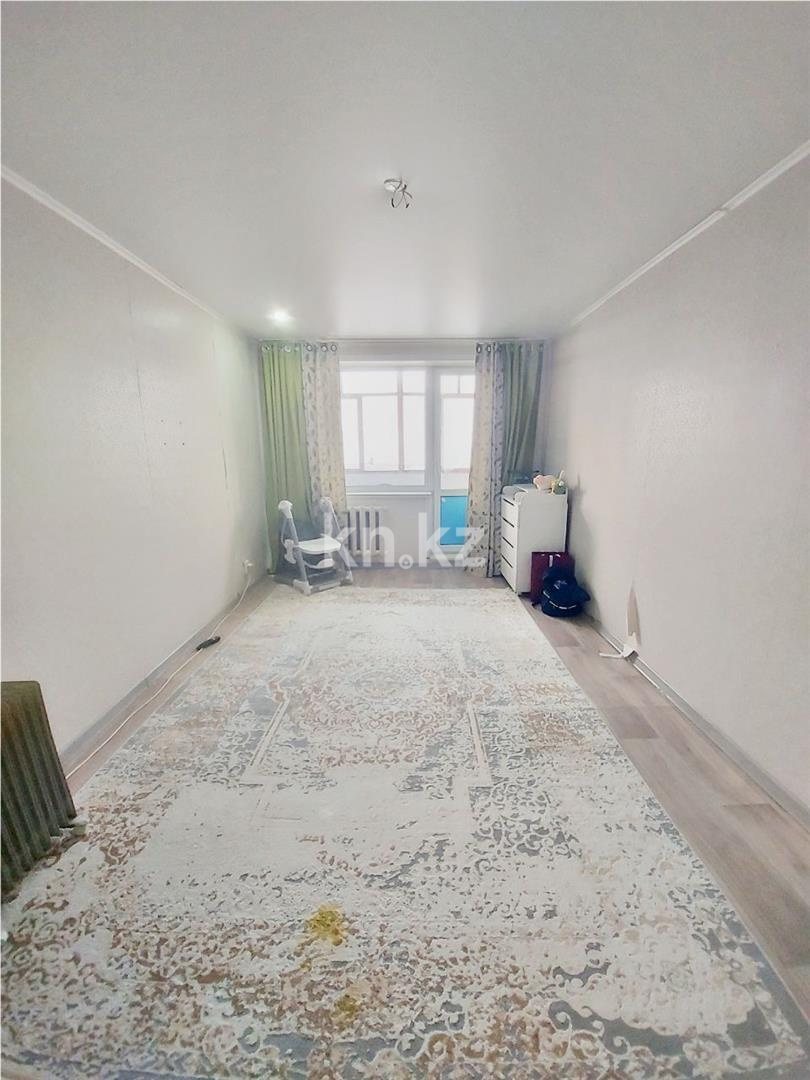 Продажа 1-комнатной квартиры, 34 м², 15 мкр., дом  26/3 в Караганде - фото 2